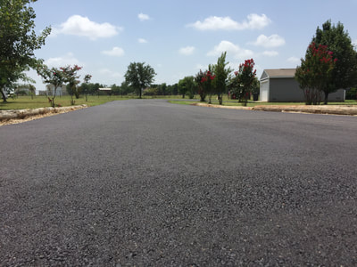 Hot mix asphalt driveway overlay