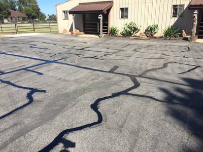Hot Rubber Crack Fill - Parking Lot Repair (before seal coating) Pilot Point, Tx.